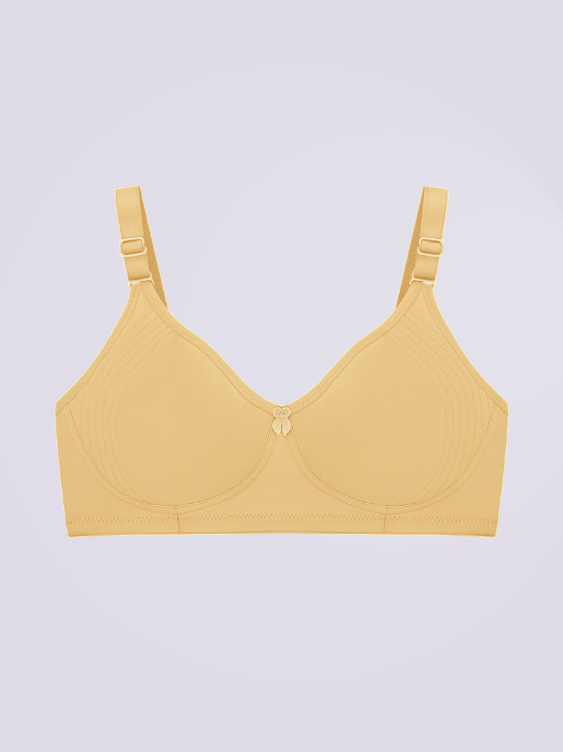 Yellow bra on a light purple background