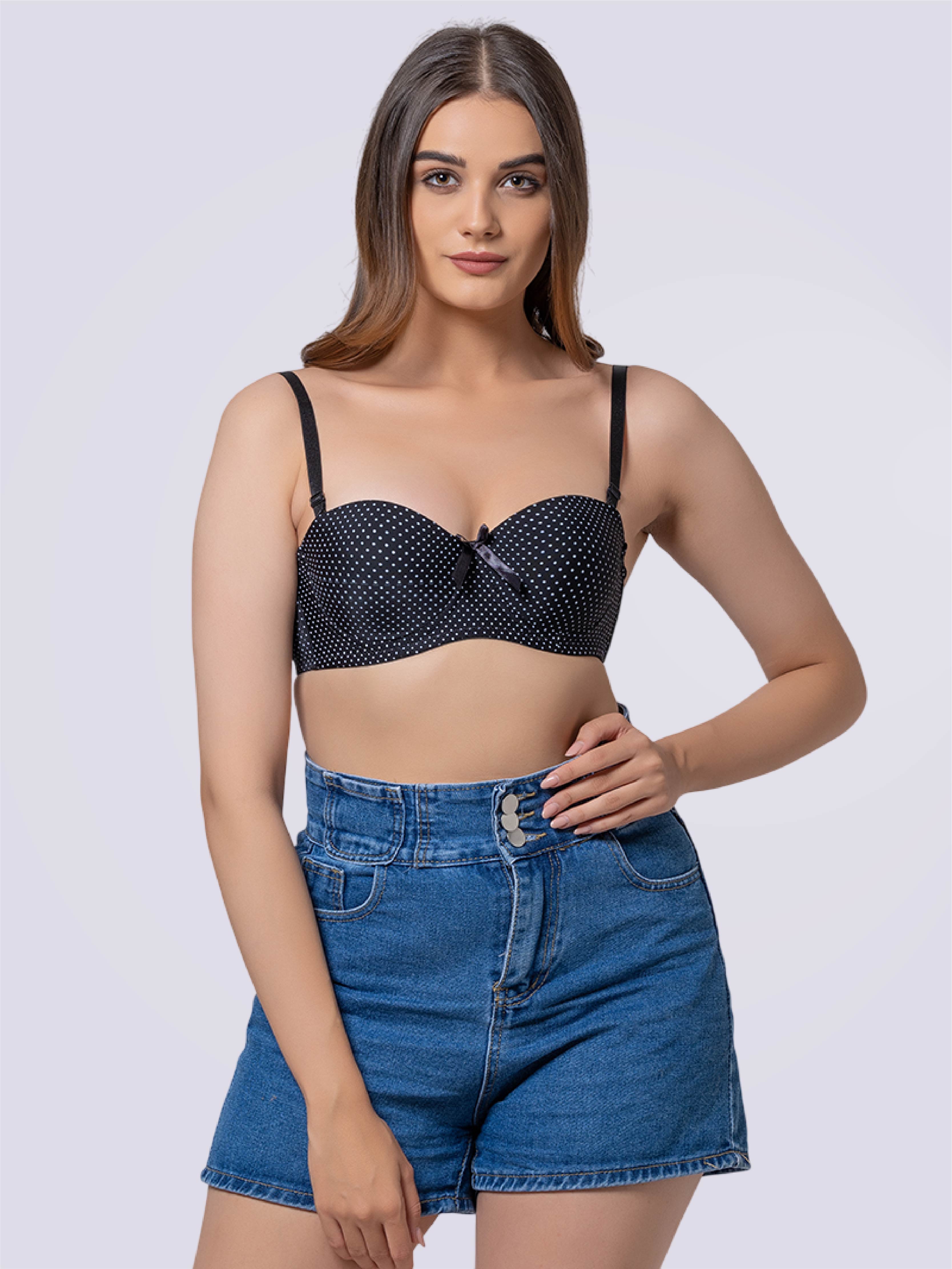 This image features a vibrant, yellow Dashing Dot Lightly Padded Underwired Demi Cup Bra, showcased on a woman. The bra is adorned with playful, black polka dots, adding a whimsical touch to its design.