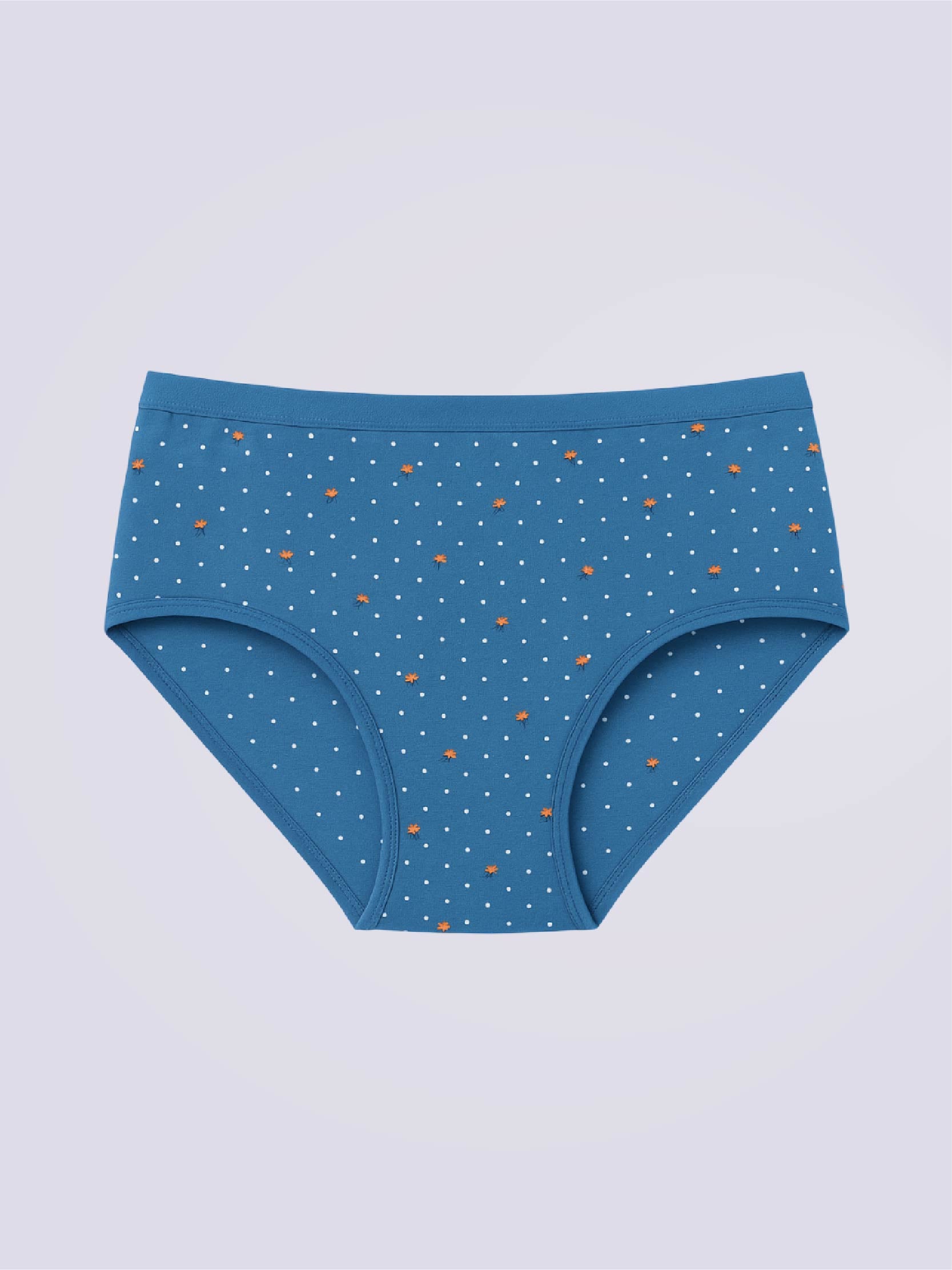 Blue women's underwear with small white polka dots on a light gray background