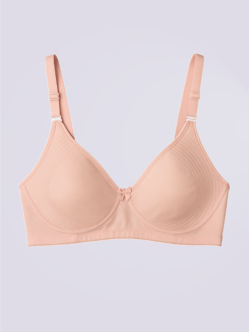 Beige bra on a light purple background