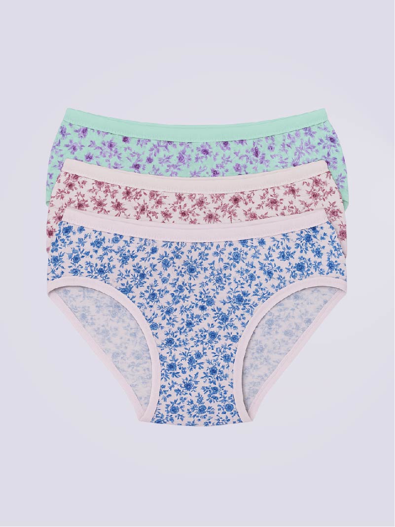 Set of three floral-patterned underwear on a light gray background