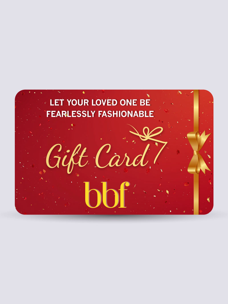 Red gift card with gold text and bow on a light gray background