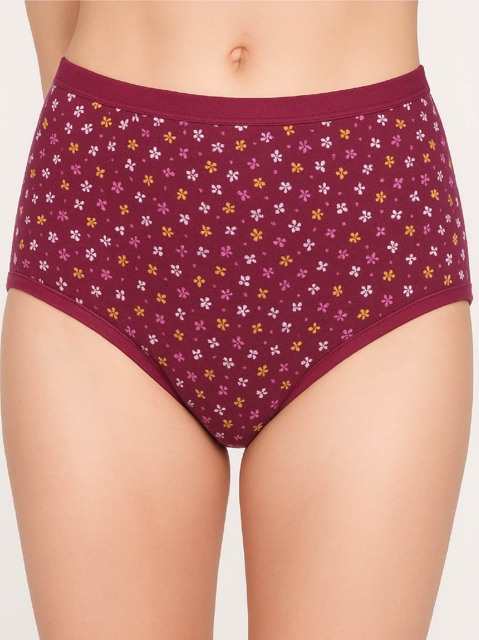Maroon underwear with floral pattern on a plain background