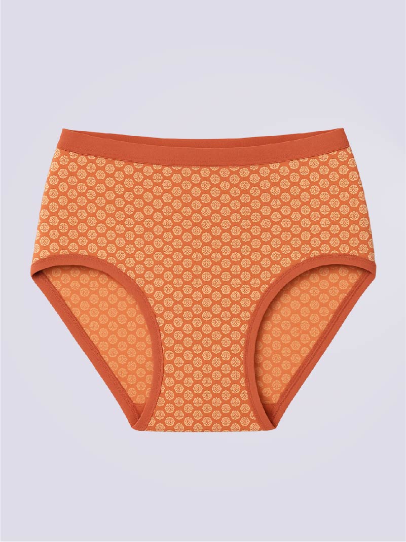 Orange patterned underwear on a light gray background