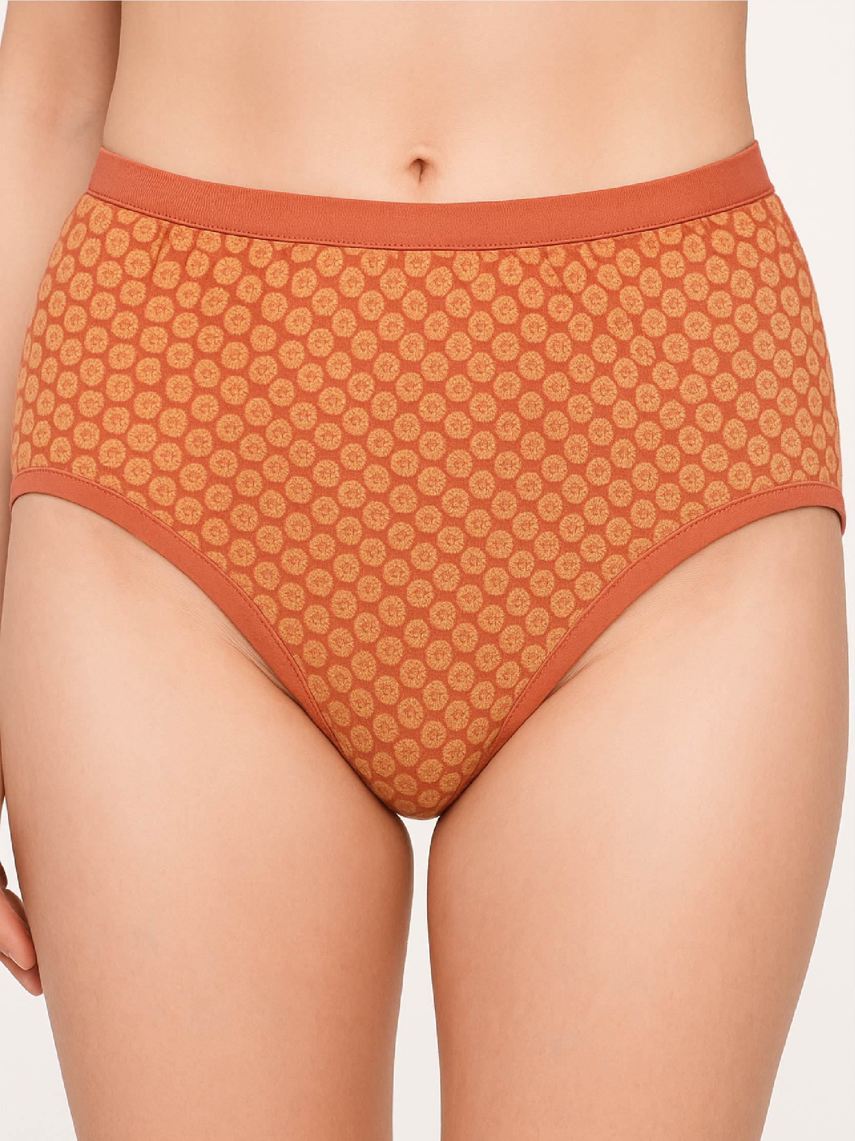 Patterned orange underwear on a plain background