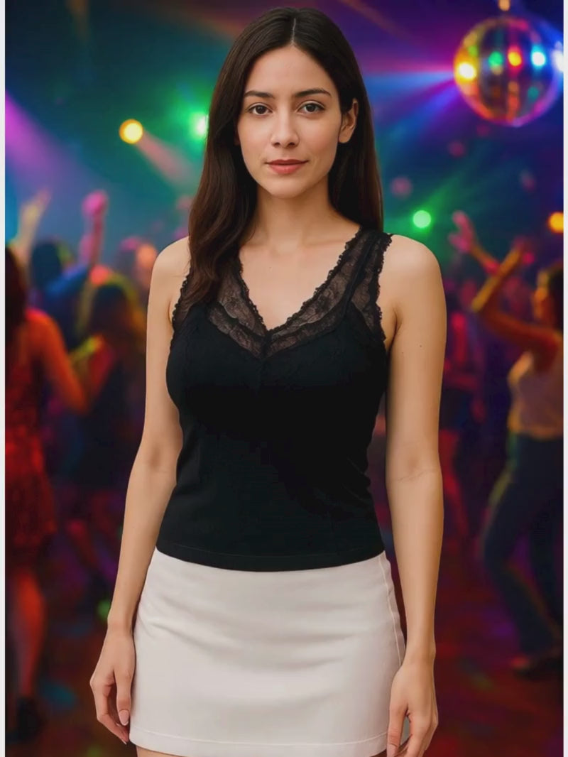 Women in black lace tank top dancing in the club